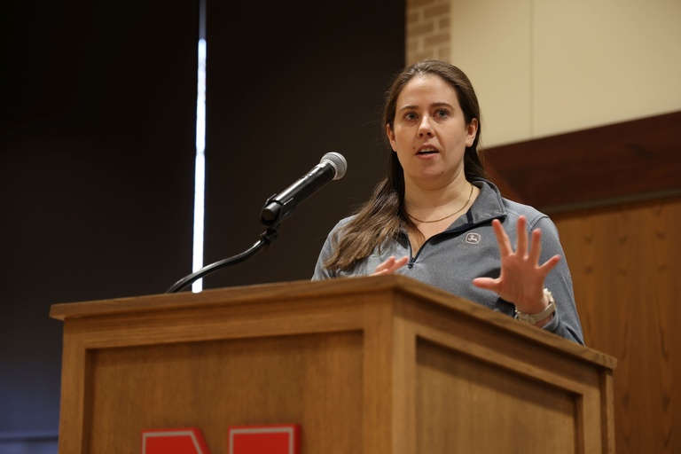 A person presenting at a conference