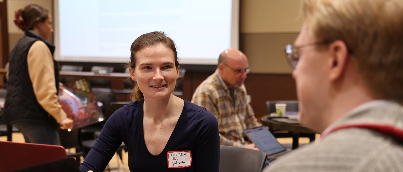 People talking at a conference